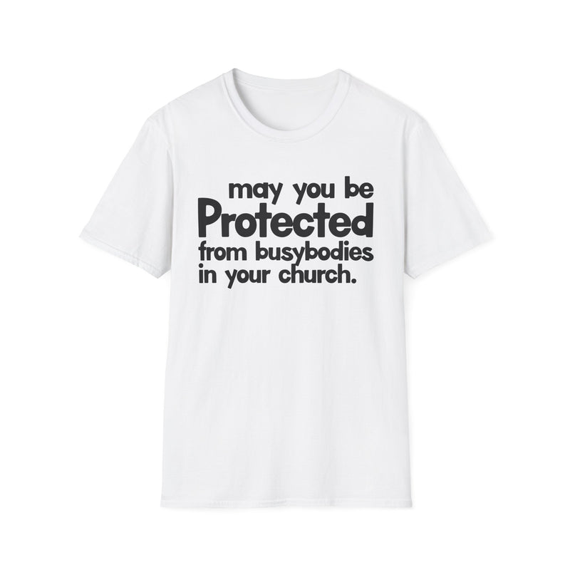 May You Be Protected From Busybodies In Your Church — T-Shirt fabric detail close-up: MAY YOU BE PROTECTED FROM BUSYBODIES IN YOUR CHURCH in bold statement lettering. Street Talk Designs protection statement apparel.