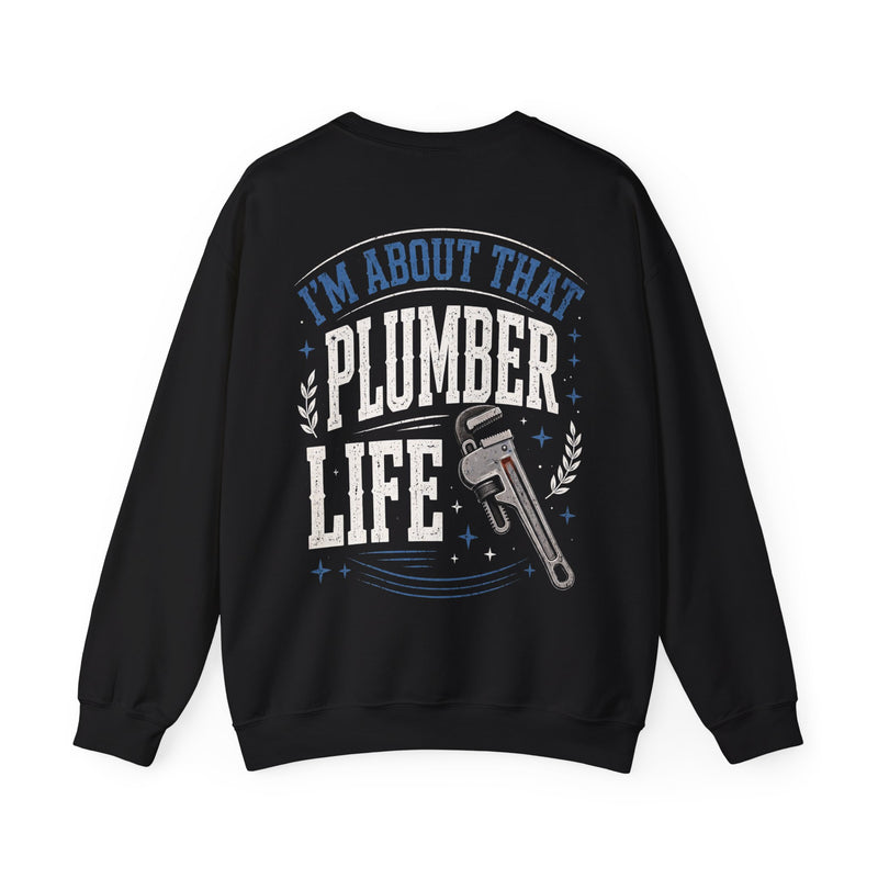 Black sweatshirt with white and blue bubble lettering reading I'M ABOUT THAT PLUMBER LIFE, back view.