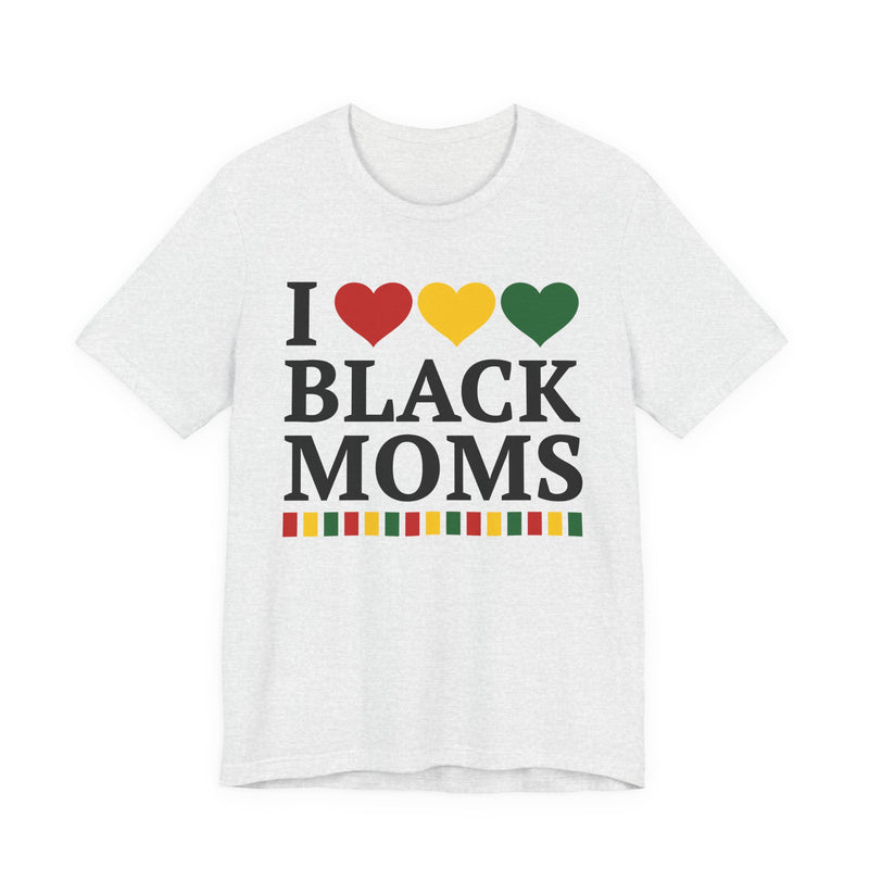 Front flat-lay of the I Love Black Moms t-shirt in Ash: black 'I' with red, gold, and green hearts above black 'BLACK MOMS' collegiate lettering, with a red, gold, and green stripe bar beneath the text.