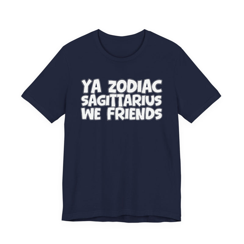 Navy t-shirt with white 'YA ZODIAC SAGITTARIUS WE FRIENDS' cartoon bubble lettering, front flat-lay view.