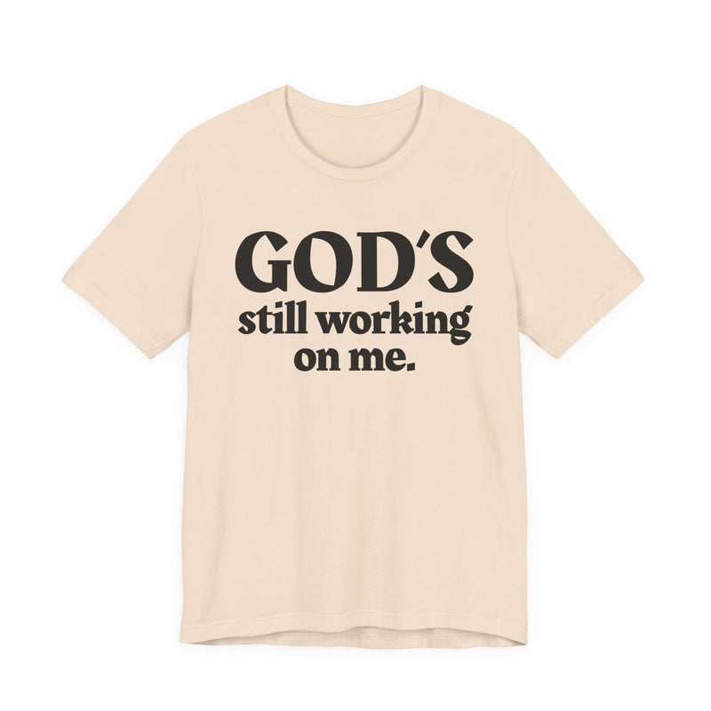 God's Still Working On Me — Christian T-Shirt