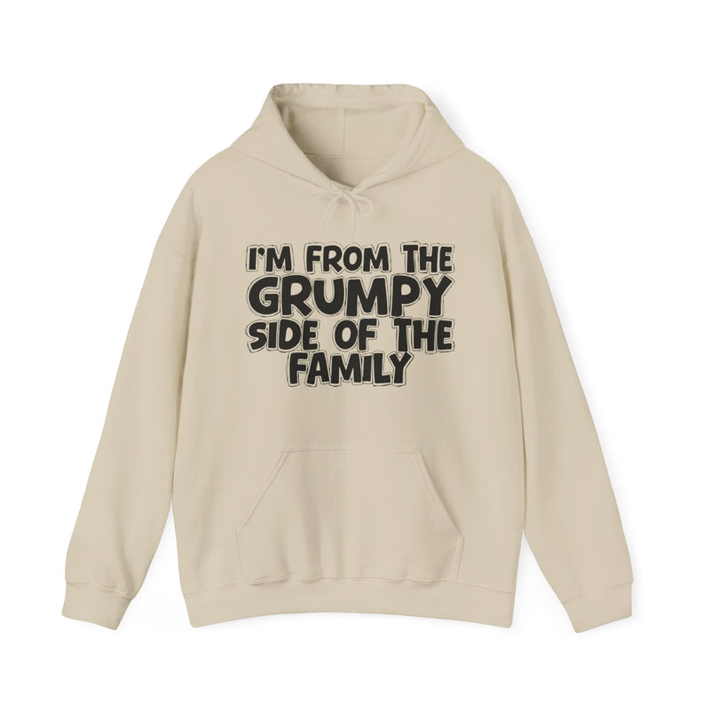 Sand hoodie with "I'M FROM THE GRUMPY SIDE OF THE FAMILY" in bold black outlined bubble lettering, front flat-lay view