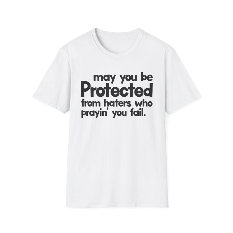 May You Be Protected From Haters Who Prayin' You Fail — T-Shirt fabric detail close-up: MAY YOU BE PROTECTED FROM HATERS WHO PRAYIN' YOU FAIL in bold statement lettering. Street Talk Designs protection statement apparel.
