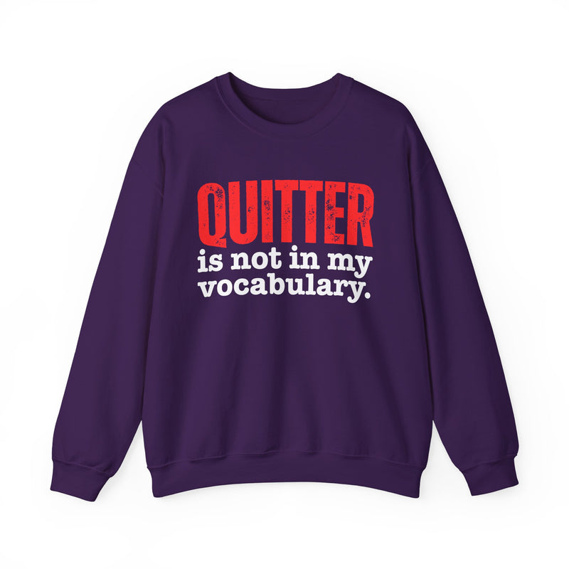 Graphic sweatshirt with bold statement lettering reading "QUITTER IS NOT IN MY VOCABULARY", front view, product mockup