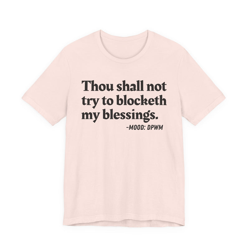 T-Shirt with “THOU SHALL NOT TRY TO BLOCKETH MY BLESSINGS” statement print