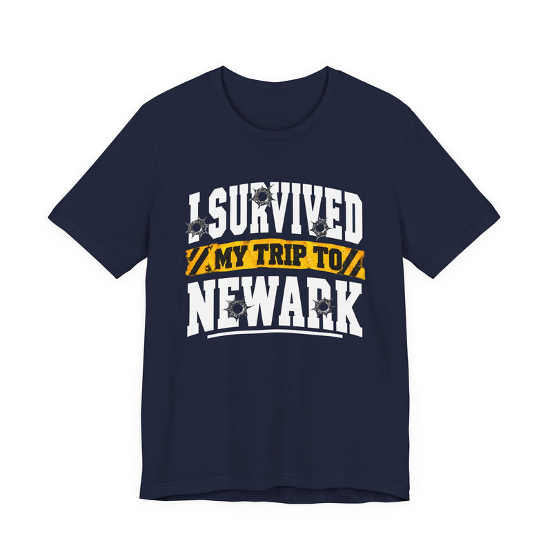 T-Shirt with collegiate lettering reading I SURVIVED MY TRIP TO NEWARK, front view.