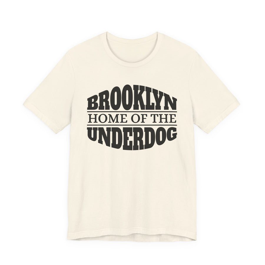 T-shirt with bold lettering reading BROOKLYN (HOME OF THE) UNDERDOG, product view.