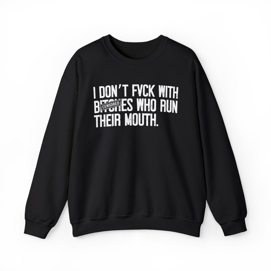 Black sweatshirt with white bold condensed lettering reading I DON'T FVCK WITH BITCHES WHO RUN THEIR MOUTH, with a CENSORED bar stamped over "BITCHES", front flat-lay view.