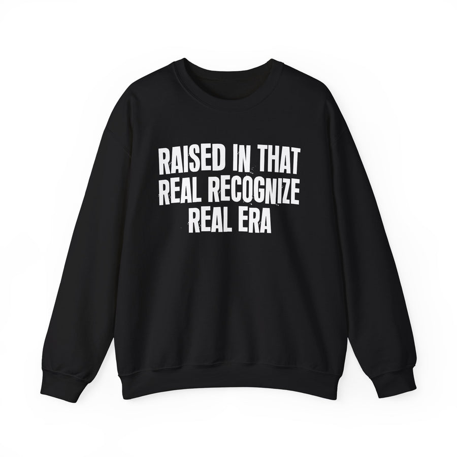 Sweatshirt product with lettering reading "RAISED IN THAT REAL RECOGNIZE REAL ERA", front view.