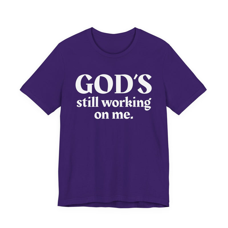 God's Still Working On Me — Christian T-Shirt