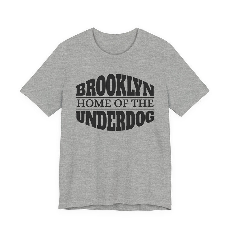 T-shirt with bold lettering reading BROOKLYN (HOME OF THE) UNDERDOG, product view.
