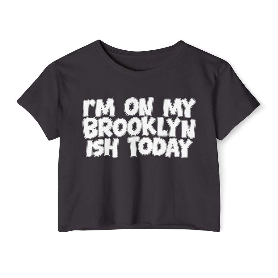 Black crop top with white hand-lettered "I'M ON MY BROOKLYN ISH TODAY" text, front view.