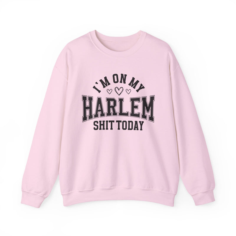 Sweatshirt product photo with arched collegiate lettering reading "I'M ON MY" with three hearts beneath, over large block letters reading "HARLEM" with "SHIT TODAY" beneath, front view.