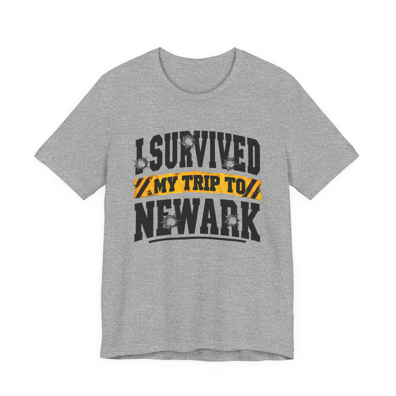 T-Shirt with collegiate lettering reading I SURVIVED MY TRIP TO NEWARK, front view.
