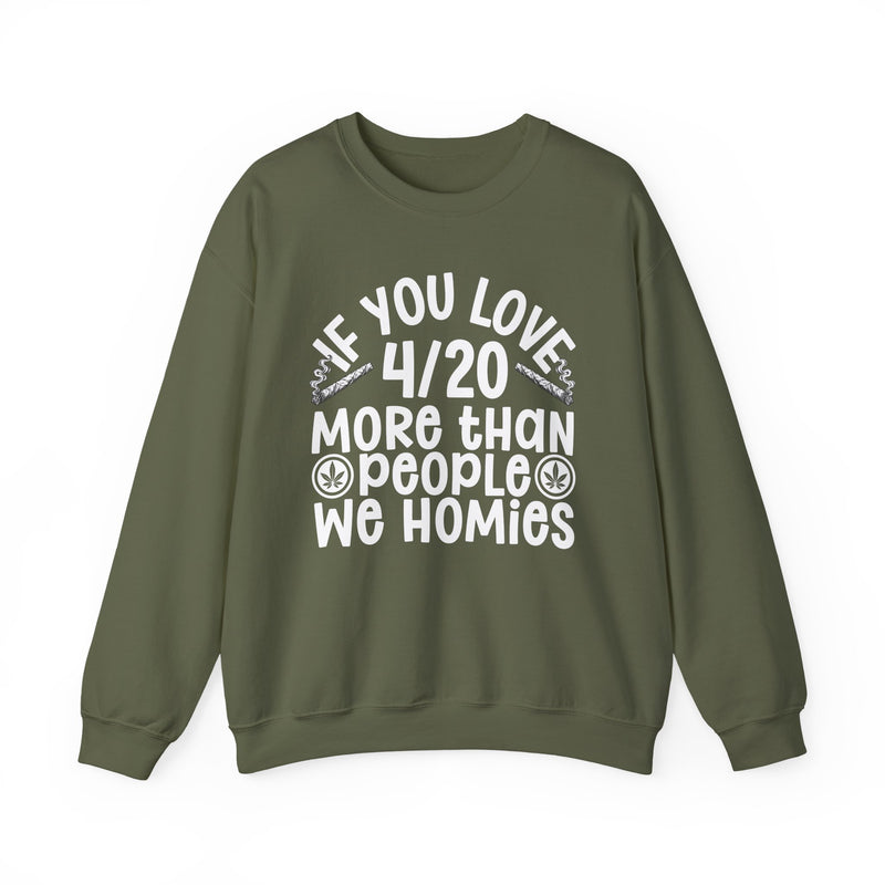If You Love 4/20 More Than People We Homies — Sweatshirt front view: IF YOU LOVE 4/20 MORE THAN PEOPLE WE HOMIES in white rounded lettering with joint and leaf graphics — white rounded lettering with joint and leaf graphics on olive. Street Talk Designs 420-friendly statement apparel.
