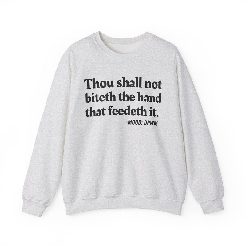 Sweatshirt with text design reading “THOU SHALL NOT BITETH THE HAND THAT FEEDETH IT”, front view