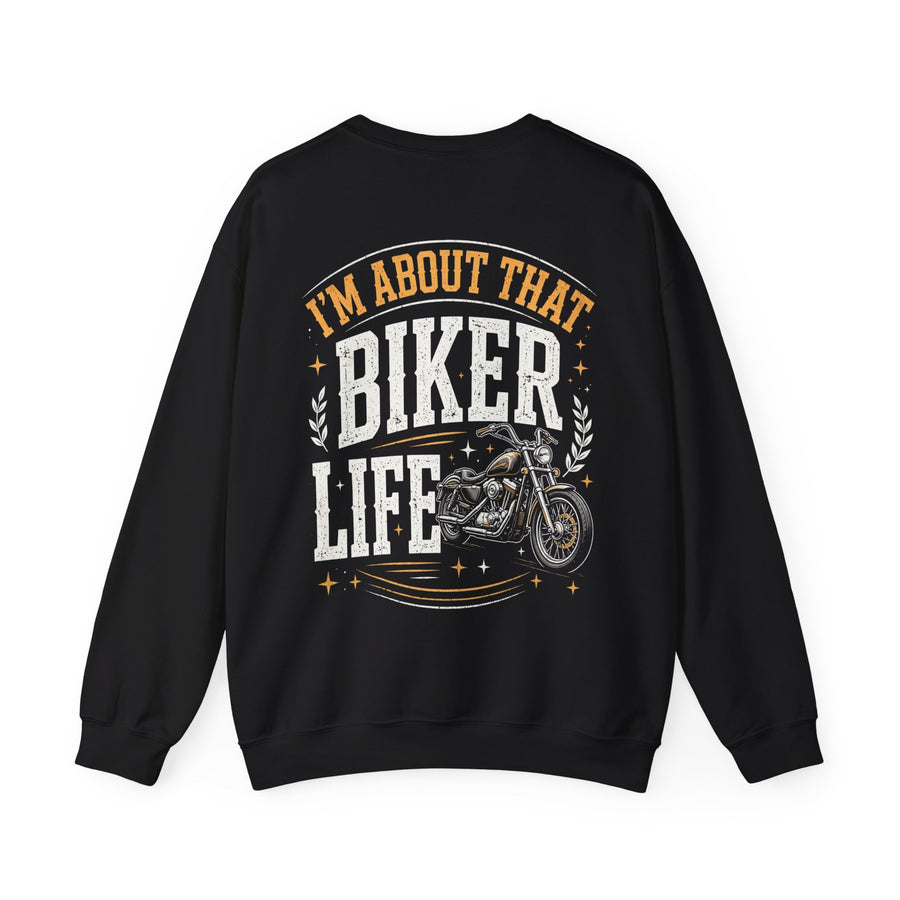Black sweatshirt with white and gold western lettering reading "I'M ABOUT THAT BIKER LIFE", back flat-lay view.