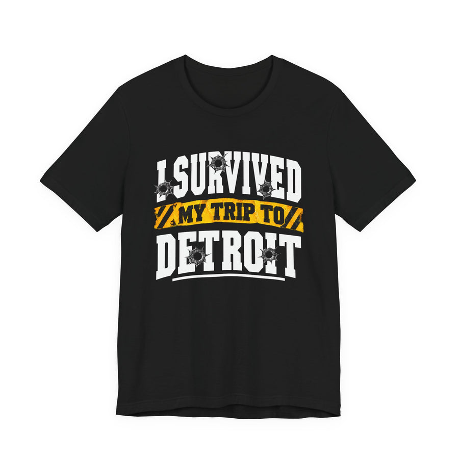T-shirt with bold lettering reading I SURVIVED MY TRIP TO DETROIT, product view.