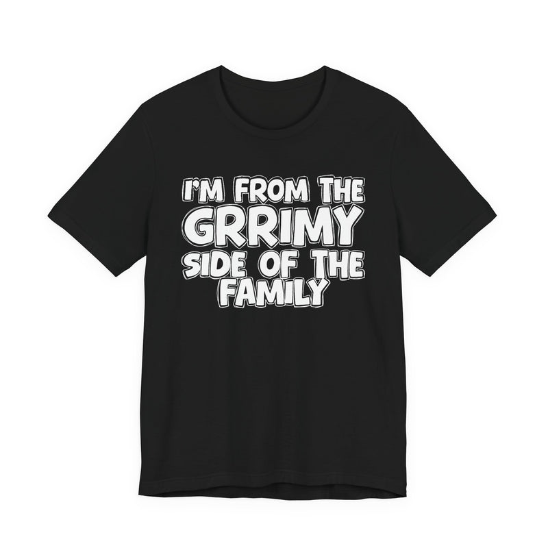 Black t-shirt, printed with the "I'M FROM THE GRRIMY SIDE OF THE FAMILY" statement in bold outlined bubble lettering, front flat-lay view.