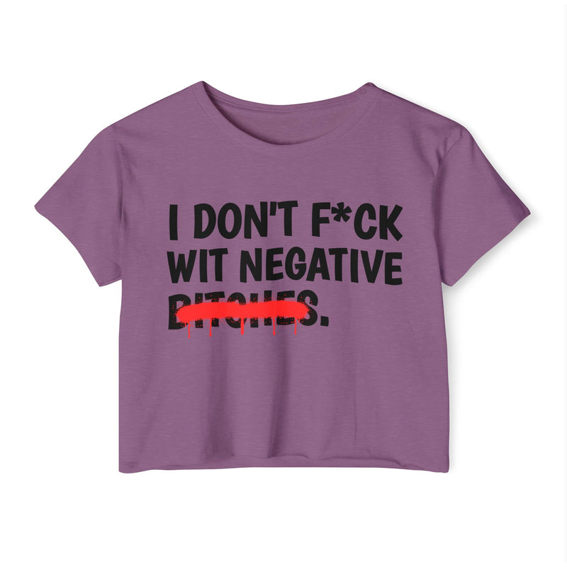 Ash crop top with dark bold boundary lettering reading I DON'T FUCK WIT NEGATIVE BITCHES, front flat-lay view.
