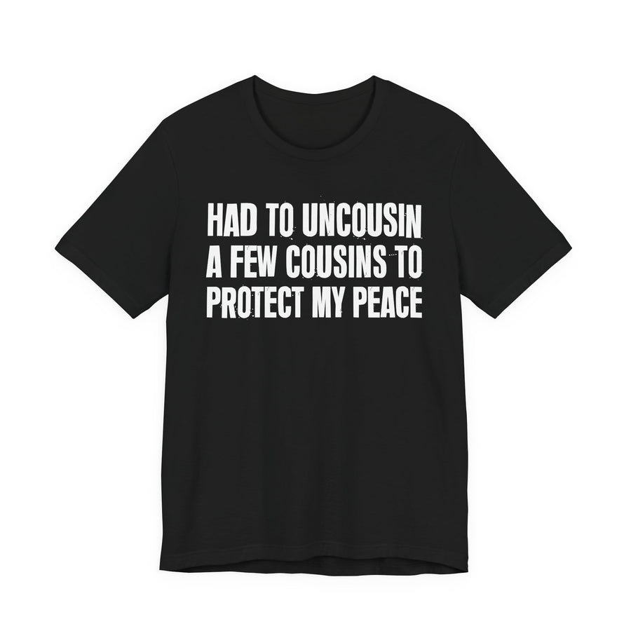 Black T-shirt with the "HAD TO UNCOUSIN A FEW COUSINS TO PROTECT MY PEACE" graphic, front view.