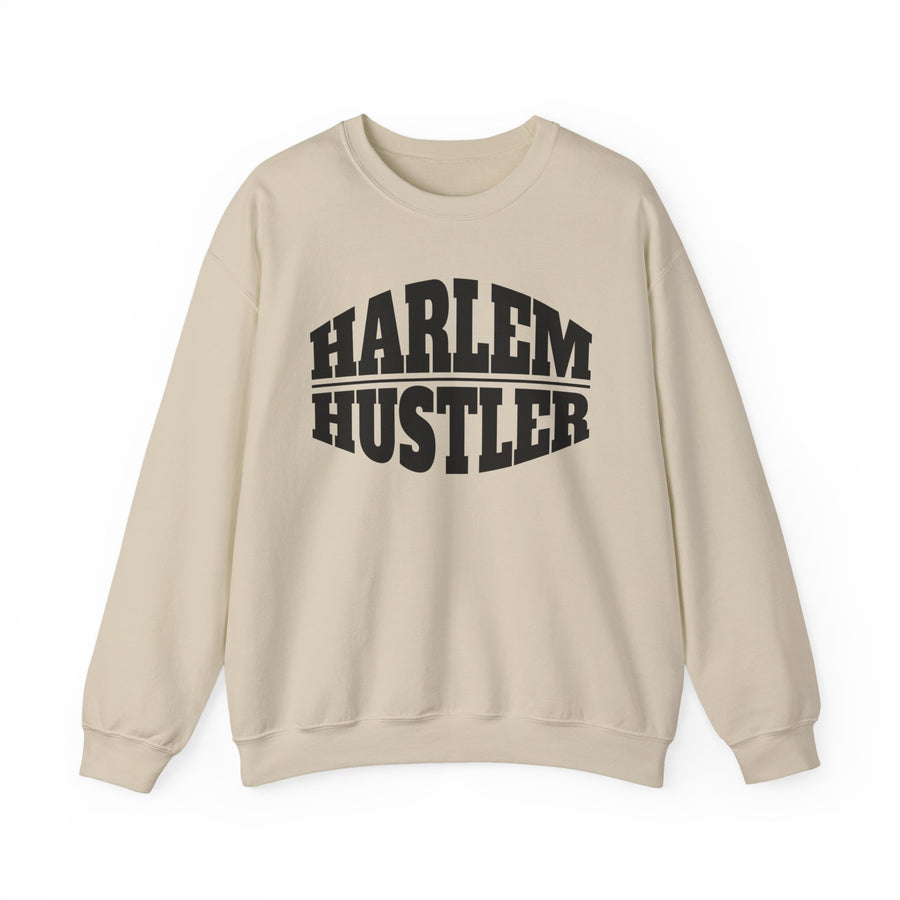 Sand sweatshirt with black collegiate bubble lettering reading HARLEM HUSTLER, front flat-lay view.