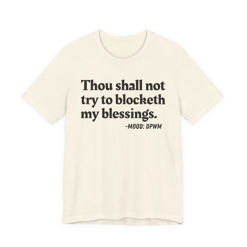 T-Shirt with “THOU SHALL NOT TRY TO BLOCKETH MY BLESSINGS” statement print