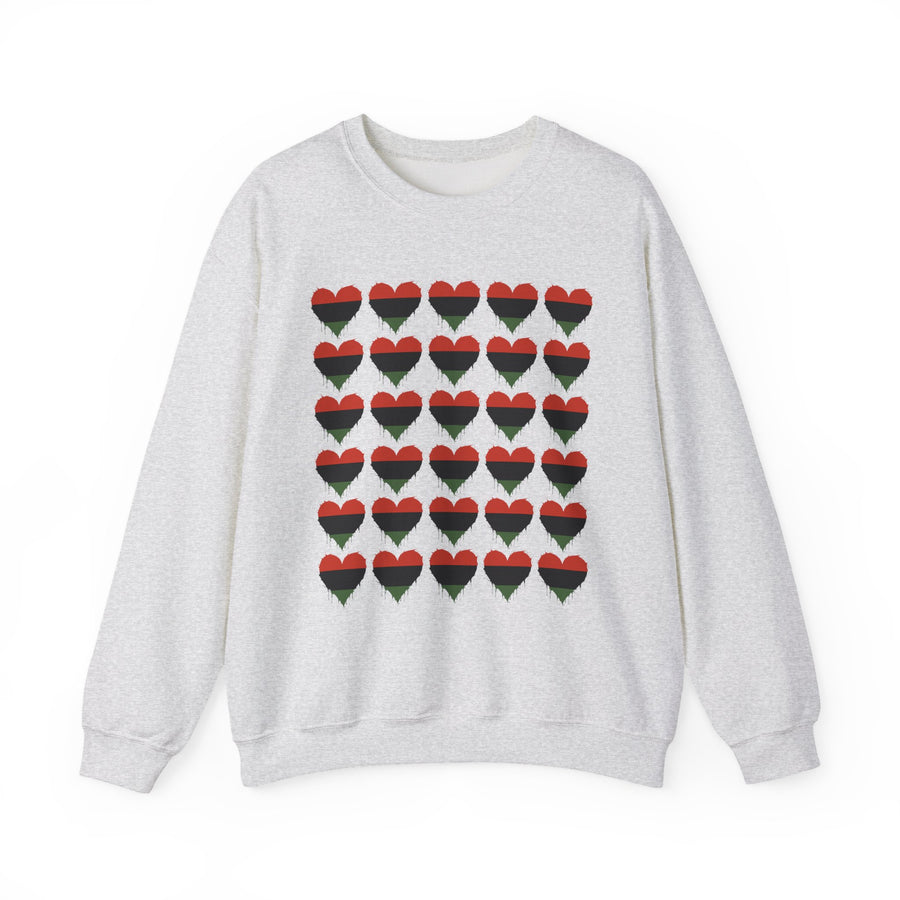 Pan-African Flag Heart Grid — Sweatshirt front view: thirty hearts striped red, black, and green in a grid — the Pan-African flag colors. Street Talk Designs culture statement apparel.