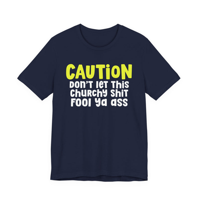 T-Shirt in Navy with lettering reading "CAUTION DON'T LET THIS CHURCHY FOOL YA ASS", front view.