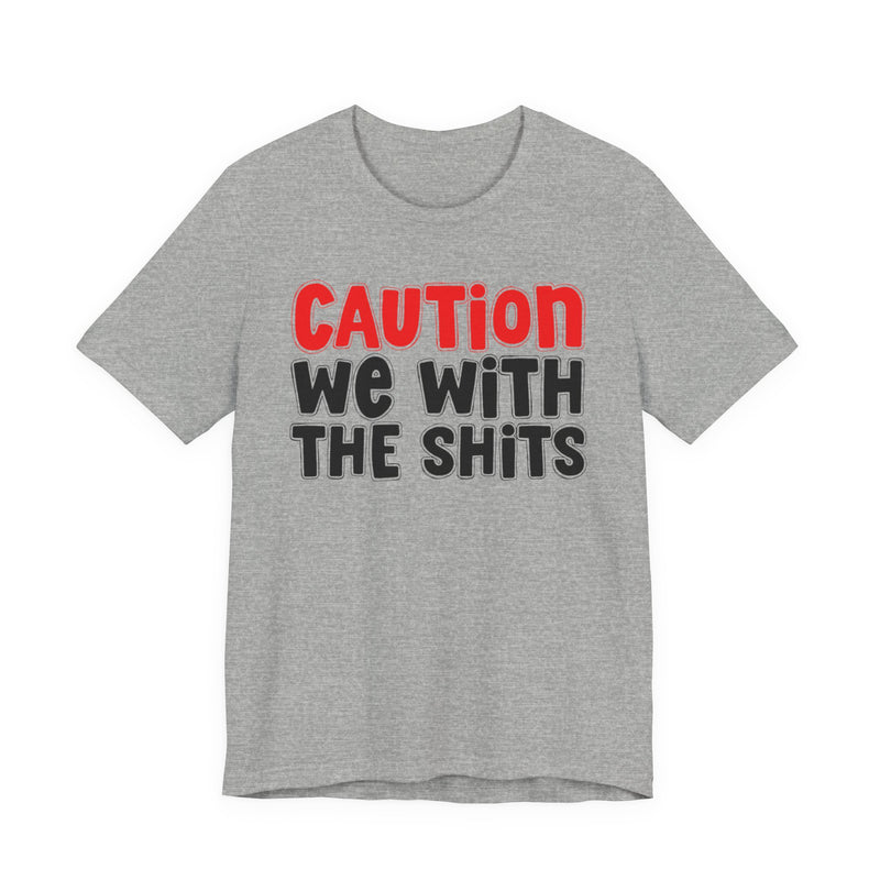 T-Shirt in Athletic Heather with lettering reading "CAUTION WE WITH THE SHITS", front view.