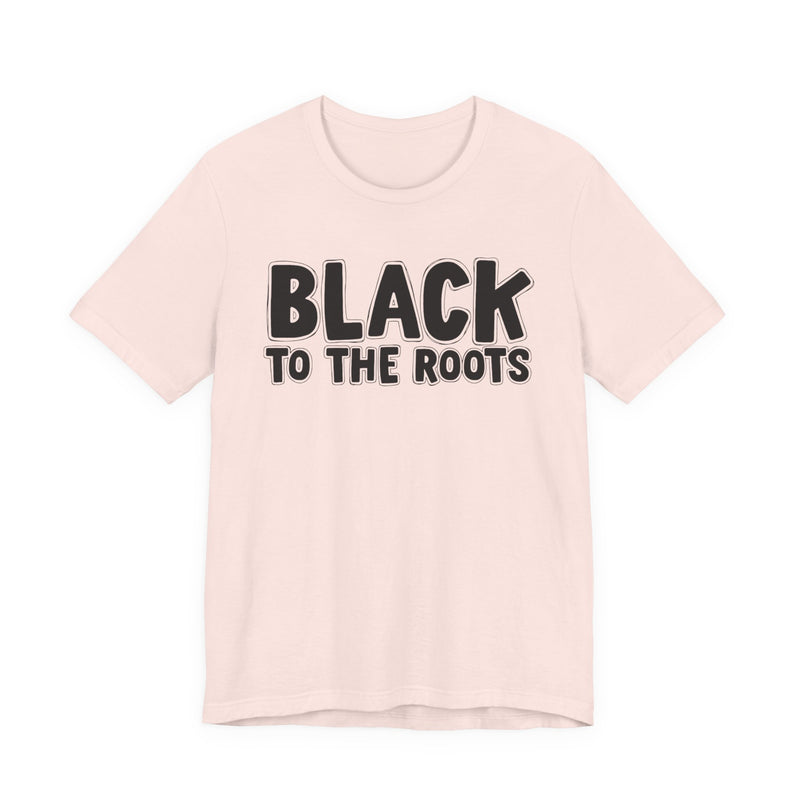 Black To The Roots — T-Shirt fabric detail close-up: BLACK TO THE ROOTS in bold statement lettering. Street Talk Designs culture statement apparel.