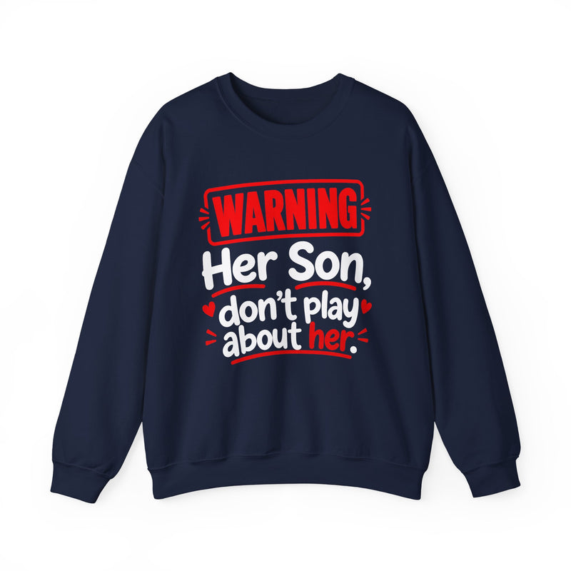 Warning — Her Son Don’t Play About Her — Sweatshirt fabric detail close-up: lettering reading 'WARNING - HER SON DON’T PLAY ABOUT HER'. Street Talk Designs family statement apparel.