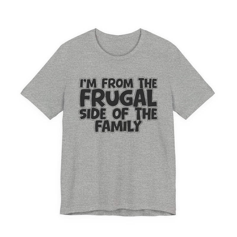 Athletic Heather t-shirt with 'I'M FROM THE FRUGAL SIDE OF THE FAMILY' in black hand-drawn bubble lettering on the chest, front flat-lay mockup view.