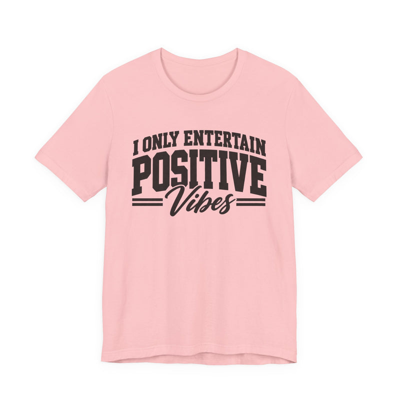 T-shirt in Pink with lettering reading "I Only Entertain Positive Vibes", front view.