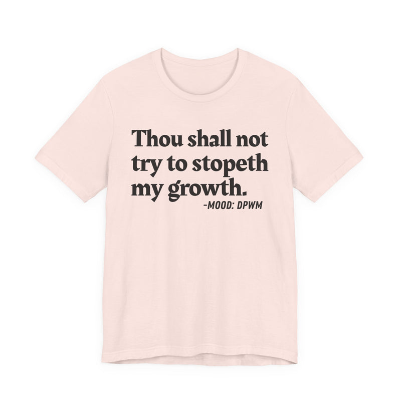 T-Shirt with “THOU SHALL NOT TRY TO STOPETH MY GROWTH” statement print
