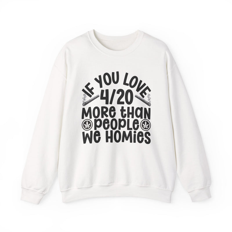 If You Love 4/20 More Than People We Homies — Sweatshirt fabric detail close-up: IF YOU LOVE 4/20 MORE THAN PEOPLE WE HOMIES in white rounded lettering with joint and leaf graphics — white rounded lettering with joint and leaf graphics on olive. Street Talk Designs 420-friendly statement apparel.