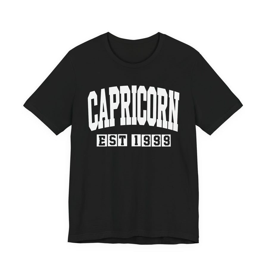 Black T-shirt with white arched CAPRICORN lettering and boxed EST 1999 print, front view.