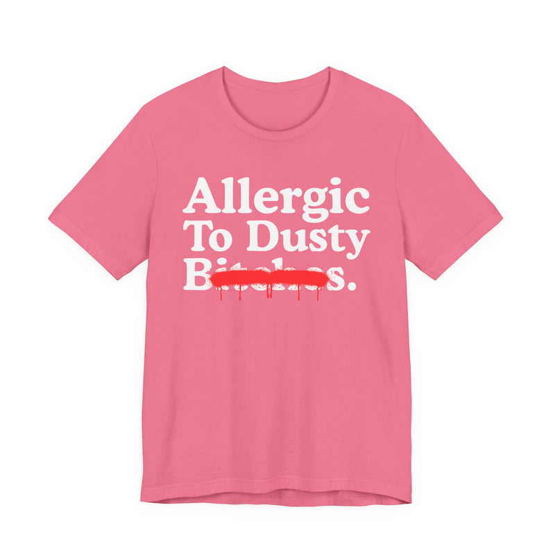 Charity Pink T-Shirt with bold statement lettering reading ALLERGIC TO DUSTY BITCHES, front flat-lay view.