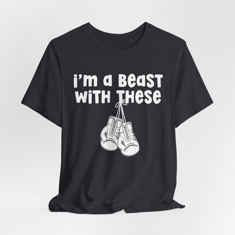 Black t-shirt with boxing gloves and cream collegiate lettering reading I'M A BEAST WITH THESE, flat-lay view.