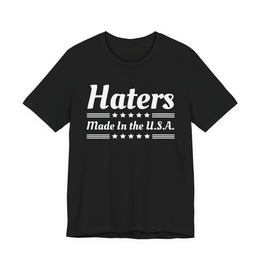 Haters Made In The USA — T-Shirt front view: HATERS MADE IN THE USA in bold statement lettering. Street Talk Designs politics and power statement apparel.