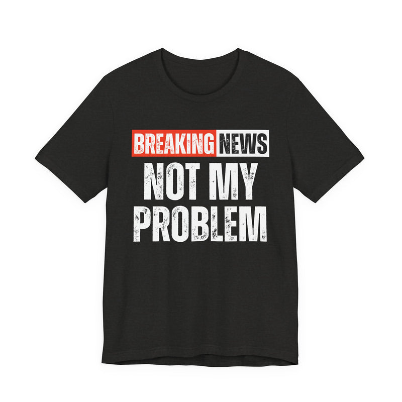 BREAKING NEWS: NOT MY PROBLEM distressed news-bar text design — t-shirt in Pepper, front view, product mockup on white background