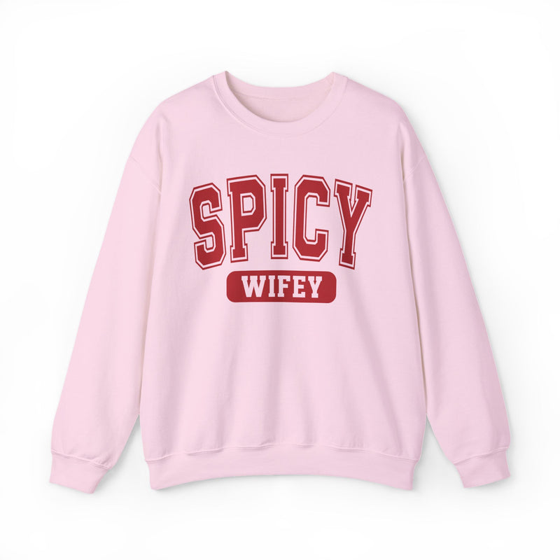Natural sweatshirt with dark bold playful lettering reading SPICY WIFEY, front flat-lay view.