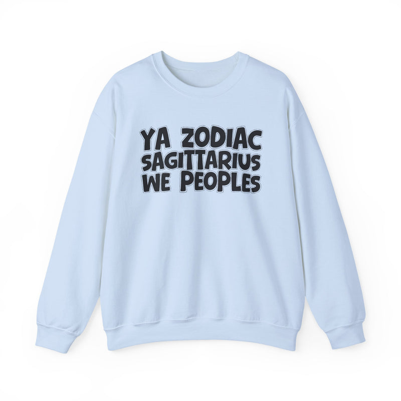 Light blue sweatshirt with black hand-lettered YA ZODIAC SAGITTARIUS WE PEOPLES print, front flat-lay view.