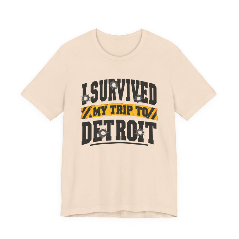 T-shirt with bold lettering reading I SURVIVED MY TRIP TO DETROIT, product view.