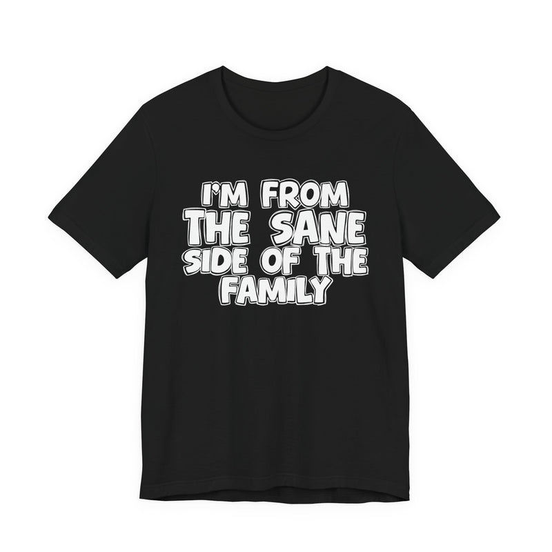 Black t-shirt, printed with the "I'M FROM THE SANE SIDE OF THE FAMILY" statement in bold outlined bubble lettering, front flat-lay view.