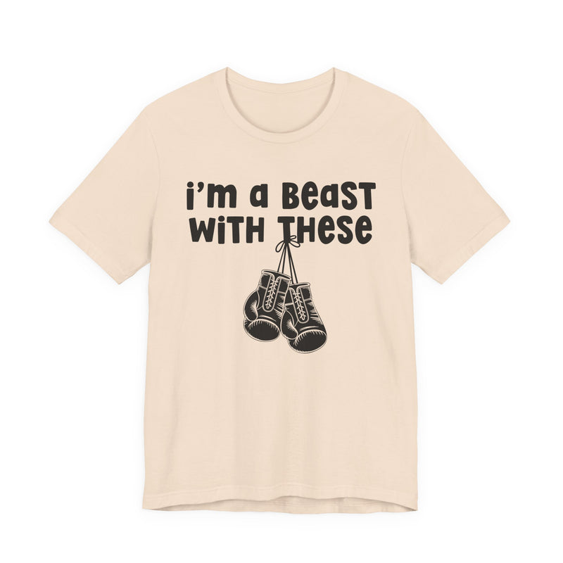 White t-shirt with boxing gloves and cream collegiate lettering reading I'M A BEAST WITH THESE, flat-lay view.