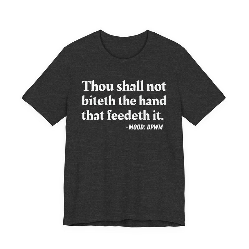 T-Shirt with text design reading “THOU SHALL NOT BITETH THE HAND THAT FEEDETH IT”, front view