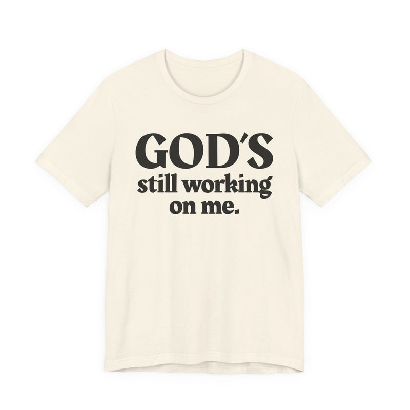 God's Still Working On Me — Christian T-Shirt