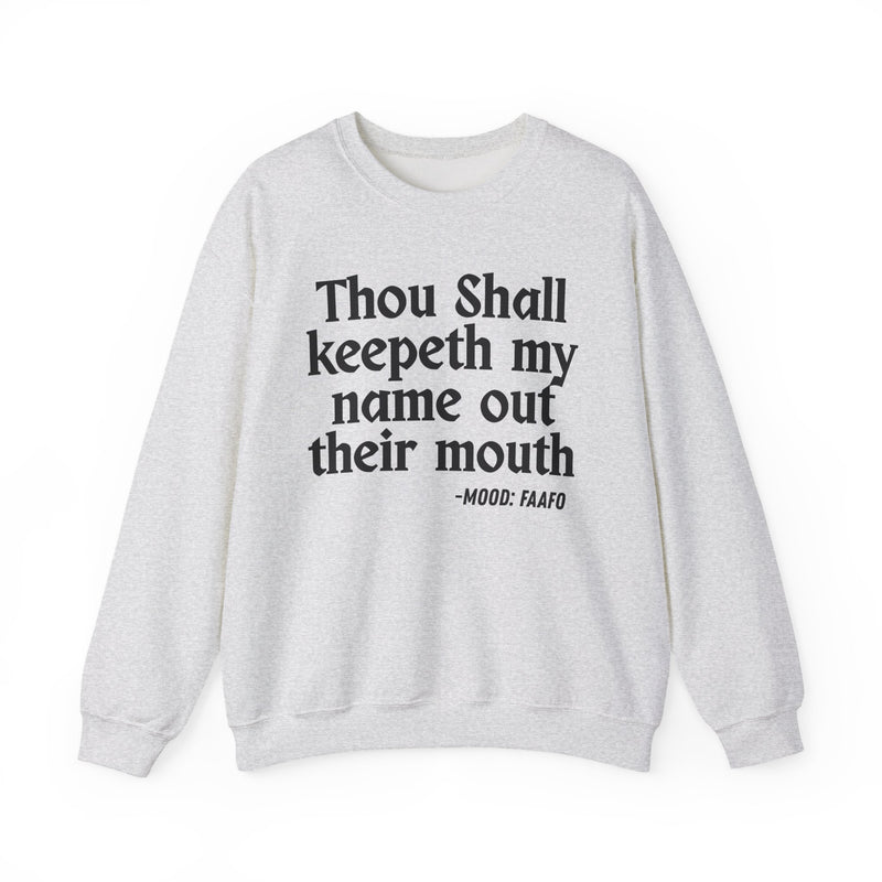 Sweatshirt with text design reading “THOU SHALL KEEPETH MY NAME OUT THEIR MOUTH”, front view