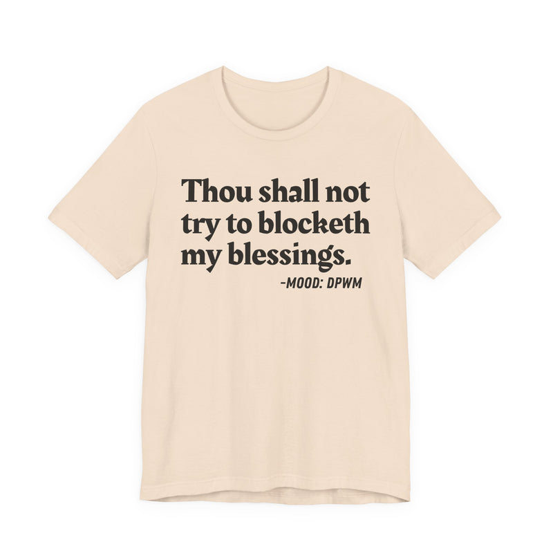 T-Shirt with “THOU SHALL NOT TRY TO BLOCKETH MY BLESSINGS” statement print